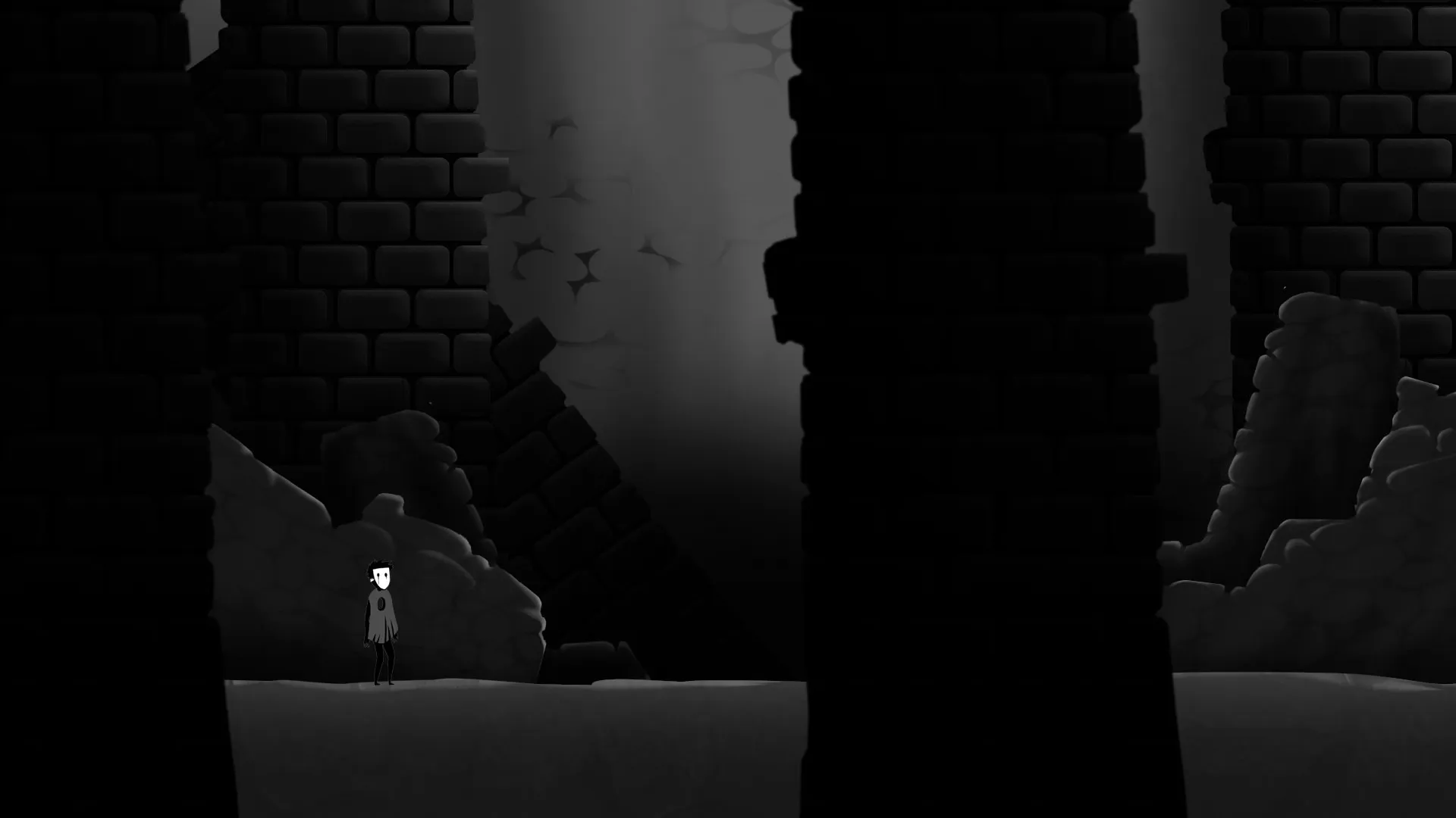 A small figure in a grey cloak standing among black brick ruins.